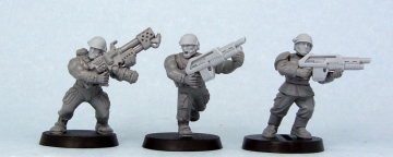 L to R: Catachan w/ Mad Robot head, Catachan w/ Mad Robot head and pulse rifle, Cadian w/ Mad Robot head and pulse rifle