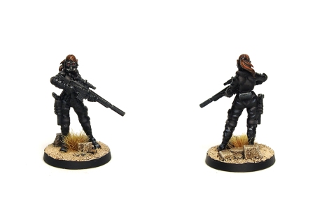 Photo of assassin miniature with rifle, dressed in all black. Front and back views.